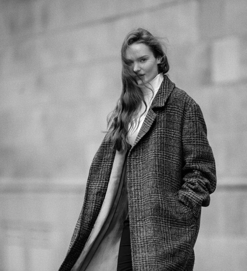 Woman in a long patterned coat