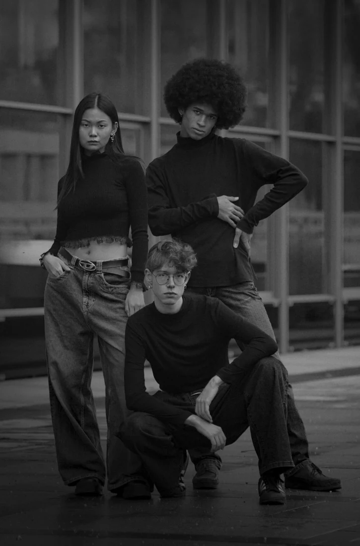 Group portrait of three young people